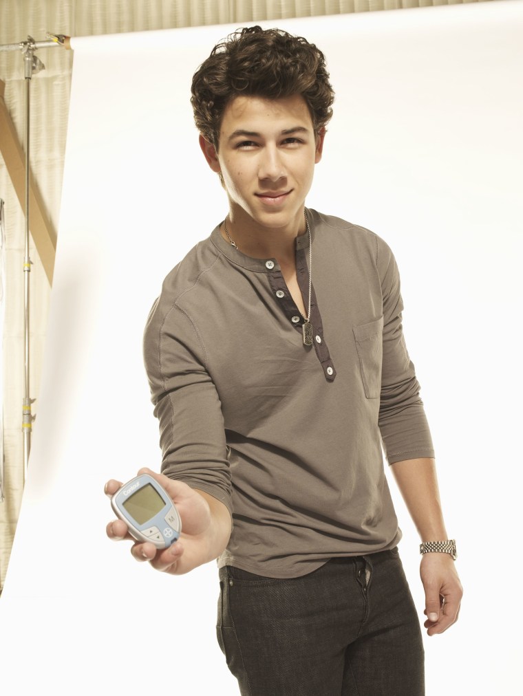 Nick Jonas of the Jonas Brothers with Bayer Contour Meter.